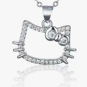 NWOT Sanrio Hello Kitty Silver Pendant and Necklace